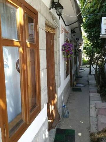 Фото номера Апартаменты с террасой Мини-отель Guest House U Natalyi г. Алахадзы 11