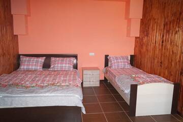 Фото номера Люкс с балконом Проживание в семье Rooms Fialka, Biryuza г. Алахадзы 38