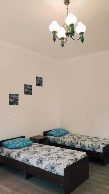 Фото номера Люкс с балконом Проживание в семье Rooms Fialka, Biryuza г. Алахадзы 27