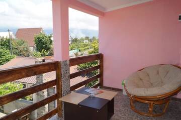 Фото номера Люкс с балконом Проживание в семье Rooms Fialka, Biryuza г. Алахадзы 57