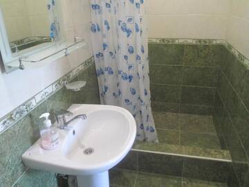 Фото номера Роскошный четырехместный номер Гостевой дом Guest House У ДЕДУШКИ САМВЕЛА г. Алахадзы 8