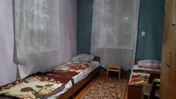Фото номера Просторный двухместный номер с 2 отдельными кроватями Гостевой дом Гостевой дом у моря г. Алахадзы 15