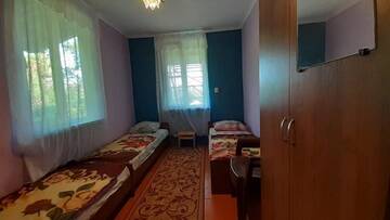 Фото номера Просторный двухместный номер с 2 отдельными кроватями Гостевой дом Гостевой дом у моря г. Алахадзы 18