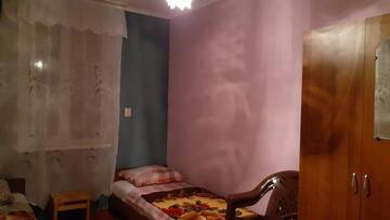Фото номера Просторный двухместный номер с 2 отдельными кроватями Гостевой дом Гостевой дом у моря г. Алахадзы 5