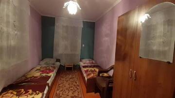 Фото номера Просторный двухместный номер с 2 отдельными кроватями Гостевой дом Гостевой дом у моря г. Алахадзы 3